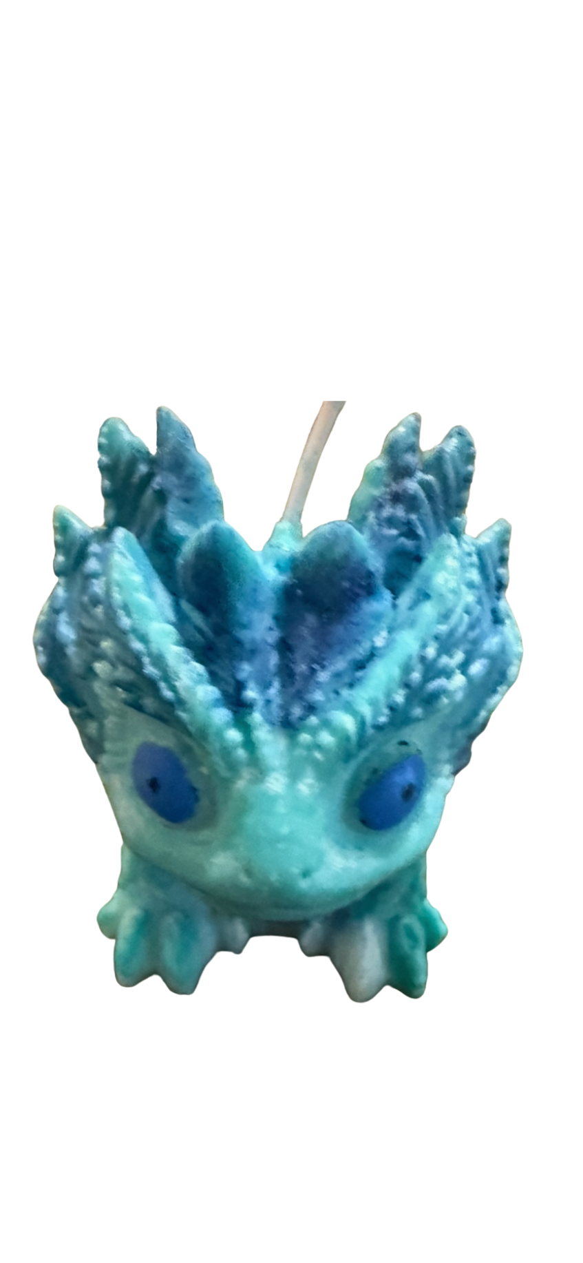 Baby dragon candle